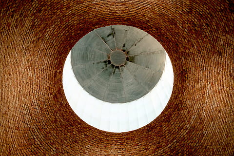low, angle photography, brown, hole, buildings, structure, architecture, design, stones, circles, deep, circle, tunnel, geometric shape, shape, pattern, no people, backgrounds, built structure, close-up, day, textured, sunlight, outdoors, full frame, nature, building exterior, abstract, city, ceiling, directly below, concentric, 720P, CC0, public domain, royalty free
