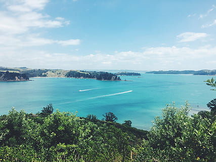 bay, beach, coast, daylight, island, landscape, nature, ocean, outdoors, scenic, sea, seascape, seashore, summer, travel, tropical, water, watercraft, sky, tree, plant, scenics - nature, beauty in nature, cloud - sky, tranquil scene, day, tranquility, blue, no people, high angle view, idyllic, nautical vessel, turquoise colored, 4K