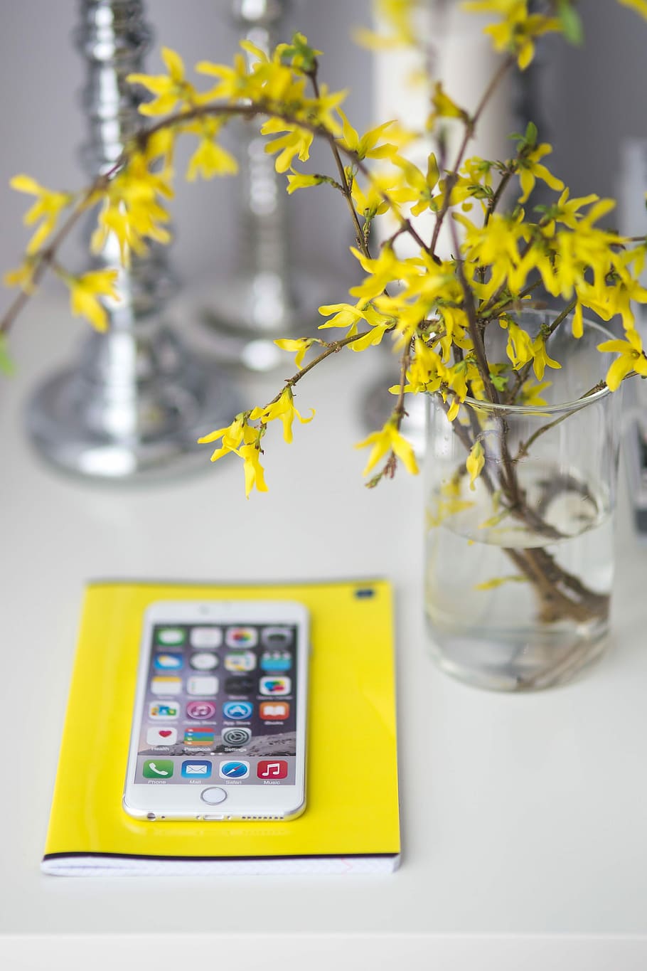 smartphone, yellow, flowers, White, notebook, mobile phone, cell phone, notepad, digital Tablet, technology, touch Screen, equipment, table, computer, internet, flower, communication, wireless technology, vase, close-up, no people, plant, flowering plant, indoors, nature, connection, portable information device, smart phone, freshness, focus on foreground, still life, 4K