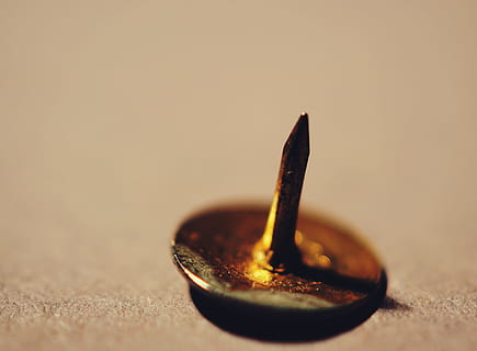 dangerous, macro, close-up, sharp, thumbtack, indoors, selective focus, no people, copy space, metal, food and drink, studio shot, still life, food, kitchen utensil, single object, table, social issues, eating utensil, spoon, wood - material, burning, 2K, CC0, public domain, royalty free
