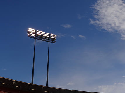 Stadium, Lights, Sky, cloud - sky, blue, floodlight, no people, industry, low angle view, architecture, built structure, nature, communication, outdoors, technology, connection, day, lighting equipment, tall - high, copy space, building exterior, antenna - aerial, global communications, 4K, CC0, public domain, royalty free