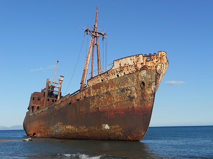 ship, wreck, nautical vessel, transportation, rusty, sea, mode of transportation, water, sky, metal, shipwreck, abandoned, nature, damaged, day, no people, decline, run-down, deterioration, blue, obsolete, sailboat, ruined, outdoors, sinking, anchored, 4K, CC0, public domain, royalty free