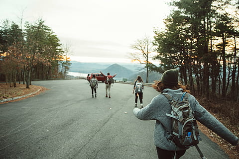 people, walking, asphalt road, towards, red, suv, three, women, one, man, road, girl, woman, travel, rural, pavement, backpack, trees, forest, woods, outdoors, nature, adventure, friends, group, rear view, adult, adults only, young adult, men, togetherness, tree, real people, plant, lifestyles, group of people, leisure activity, the way forward, transportation, direction, sky, street, warm clothing, 5K