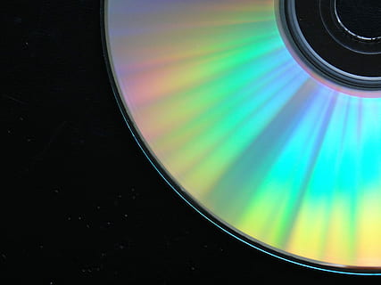 Cd, Dvd, Floppy Disk, Computer, Digital, camera - photographic equipment, photography themes, technology, close-up, film industry, no people, arts culture and entertainment, indoors, multi colored, lens - optical instrument, reflection, music, still life, black color, air vehicle, focus on foreground, optical instrument, photographic equipment, glass - material, motion, airplane, electrical equipment, 5K, CC0, public domain, royalty free