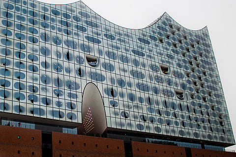 blue, white, building low-angle photography, daytime, architecture, building, infrastructure, structure, establishment, apartment, windows, condominium, hotel, built structure, building exterior, city, skyscraper, city life, window, low angle view, communication, day, office building exterior, no people, nature, sky, modern, outdoors, office, pattern, location, place, exterior, neighborhood, 2K, CC0, public domain, royalty free