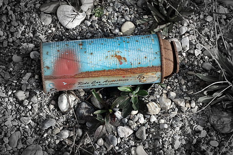 spray can, box, environment, load, rusty, metal, garbage, tin can, recycling, no people, nature, dirt, plant, day, abandoned, obsolete, high angle view, land, damaged, solid, field, stone - object, leaf, plant part, outdoors, text, old, dirty, deterioration, gravel, pebble, 2K, CC0, public domain, royalty free