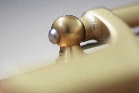 flute, hinge, joint, flap, wind instrument, gold, noble, woodwind, instrument, music, mechanics, close-up, studio shot, indoors, no people, shiny, metal, selective focus, faucet, colored background, single object, luxury, sink, wealth, household equipment, water, copy space, bathroom sink, purity, silver colored, 5K, CC0, public domain, royalty free