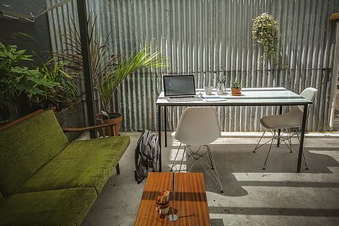 laptop computer, top, table, macbook, pro, white, beside, green, padded, sofa, Office, Life, interior, settee, workspace, chair, furniture, no People, outdoors, restaurant, decor, patio, luxury, cafe, modern, wood - Material, day, indoors, seat, plant, nature, potted plant, absence, technology, business, desk, computer, growth, window, empty, houseplant, glass, 4K, CC0, public domain, royalty free