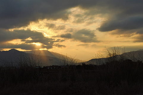 nature, sun, sunset, clouds, dusk, landscape, sky, scenics, sunrise - Dawn, outdoors, yellow, mountain, orange Color, beauty In Nature, cloud - sky, scenics - nature, tranquil scene, tranquility, environment, silhouette, no people, plant, land, non-urban scene, grass, dramatic sky, dark, 5K, CC0, public domain, royalty free