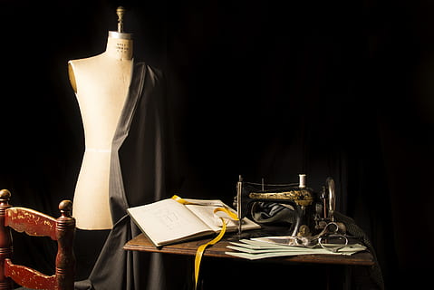 brown, sewing machine, beside, mannequin, tailoring, tailor, costume, apparel, fashion, sewing, pattern, jacket, design, plot, measuring tape, textiles, fabrics, crafts, black background, no people, indoors, studio shot, business, paper, copy space, still life, publication, book, table, group of objects, wood - material, black color, antique, dark, clothing, elegance, 5K, CC0, public domain, royalty free