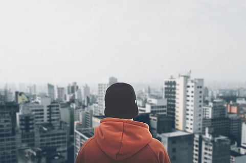 person, wearing, orange, hoodie, staring, structural, buildings, alone, architecture, business, city, cityscape, daylight, downtown, fog, foggy, looking, man, offices, outdoors, sad, scenic, skyline, skyscrapers, sunset, tower, travel, urban, building exterior, rear view, one person, built structure, building, headshot, sky, men, portrait, standing, copy space, clothing, city life, day, landscape, skyscraper, office building exterior, hood - clothing, looking at view, contemplation, 4K