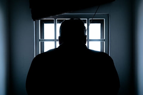 backlit, dark, indoors, light, man, person, prison, prisoner, room, scary, silhouette, window, rear view, one person, real people, headshot, men, portrait, lifestyles, adult, standing, day, domestic room, looking through window, architecture, home interior, contemplation, depression - sadness, 5K, CC0, public domain, royalty free