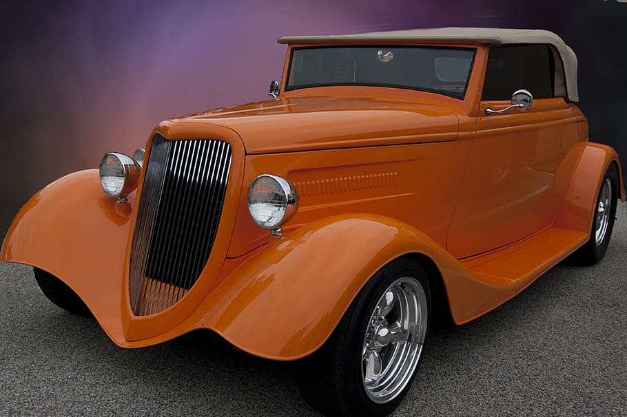 Oldtimer, alt, Jahrgang, klassisches Auto, klassisch, Auto, Automobil, Motor-, Transport, Fahren, Fahrzeug, Fahrt, draußen, keine Leute, Nahansicht, Tag, Transportmittel, Kraftfahrzeug, Landfahrzeug, Scheinwerfer, Retro-Stil, stationär, orange Farbe, Straße, Stadt, Sammlerauto, die Architektur, Antiquität, persönliches Landfahrzeug, 2K