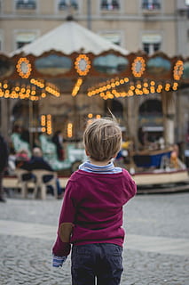 boy, wearing, blue, polo shirt, red, long-sleeved, sweat shirt, black, denim bottoms, facing, turned, carousel, daytime, red long, sweat, denim, bottoms, turned on, child, people, outdoors, caucasian Ethnicity, boys, one Person, lifestyles, happiness, rear view, childhood, children only, casual clothing, men, real people, males, focus on foreground, leisure activity, illuminated, three quarter length, city, incidental people, standing, street, warm clothing, innocence, 4K, CC0, public domain, royalty free