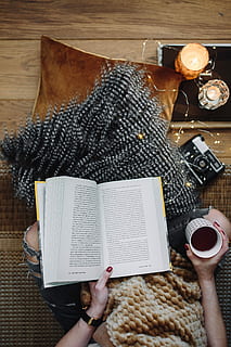 woman drinking tea, reading book, Woman, drinking, tea, female, home, book, reading, time, pillows, comfortable, cozy, hygge, fruit tea, fairy lights, women, coffee - Drink, people, table, cup, human Hand, wood - Material, females, holding, high angle view, human body part, one person, directly above, real people, publication, hand, indoors, lifestyles, personal perspective, paper, body part, adult, leisure activity, finger, 4K