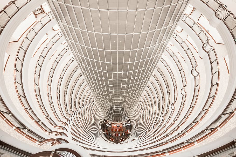 interior, architectural, photo, high-rise, building atrium, photography, white, tower, architecture, building, infrastructure, indoors, built structure, steel, futuristic, no people, concentric, spiral staircase, city, close-up, pattern, high angle view, modern, shape, geometric shape, design, curve, shopping mall, circle, architectural feature, glass - material, city life, ceiling, digital composite, ornate, luxury, 5K