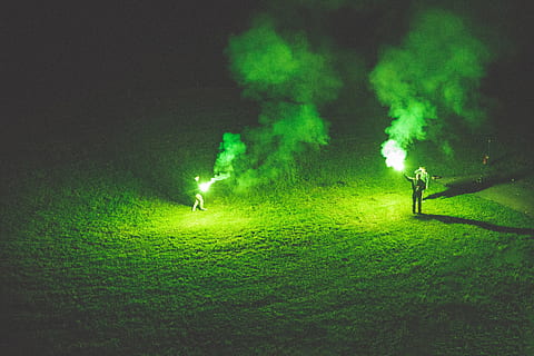 holding, green, flares, night, People, at night, green Color, grass, nature, fire - Natural Phenomenon, backgrounds, field, real people, one person, land, men, leisure activity, lifestyles, standing, illuminated, outdoors, full length, two people, environment, smoke - physical structure, unrecognizable person, landscape, photographer, 4K, CC0, public domain, royalty free