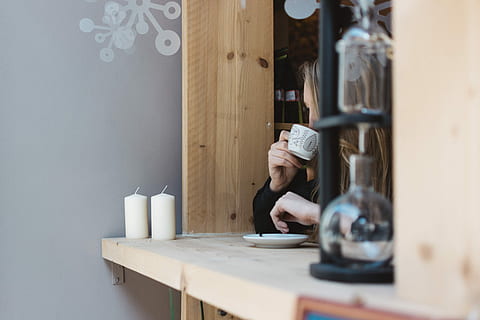 girl drinking coffee, window seat, Girl, drinking, coffee, café, drink, hands, indoors, men, one Person, people, working, adult, occupation, caucasian Ethnicity, one man only, only men, day, adults only, lifestyles, machinery, table, technology, focus on background, real people, wood - material, selective focus, human body part, domestic room, leisure activity, equipment, home interior, 5K, CC0, public domain, royalty free