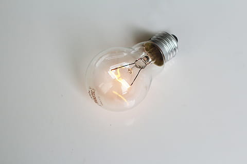 incandescent light bulb, close up, glowing, light, bulb, bright, electric, glass, electricity, idea, energy, lamp, glow, illuminated, invention, creative, inspiration, think, power, lightbulb, hand, conceptual, innovation, technology, close, lit, solution, equipment, intelligence, watt, hold, discovery, digital, dark, filament, light Bulb, electric Lamp, lighting Equipment, creativity, ideas, glass - Material, indoors, studio shot, single object, no people, fuel and power generation, copy space, energy efficient, electric light, close-up, still life, transparent, ceiling, power supply, 5K
