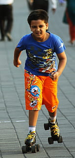 roller skating, boy, skating, young, sport, skate, male, skater, people, youth, activity, recreation, childhood, child, real people, one person, full length, front view, leisure activity, lifestyles, boys, day, casual clothing, focus on foreground, footpath, incidental people, girls, males, men, outdoors, innocence, 2K, CC0, public domain, royalty free