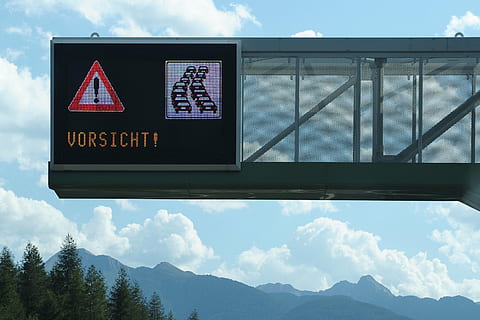 caution jam, jam, caution, road, note, traffic, signal, warning, auto, drive, warnschild, attention, cloud - sky, sign, communication, text, mountain, sky, western script, nature, day, no people, architecture, guidance, symbol, information, road sign, low angle view, transportation, built structure, information sign, 2K, CC0, public domain, royalty free