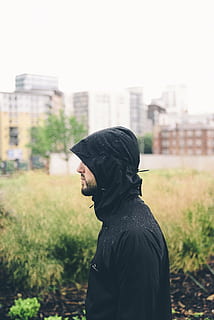 hoodie, jacket, macro, man, model, one person, real people, waist up, architecture, building exterior, side view, built structure, lifestyles, standing, focus on foreground, day, clothing, hood, leisure activity, city, men, hooded shirt, nature, hood - clothing, outdoors, obscured face, 2K, CC0, public domain, royalty free
