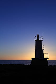 far, apus de soare, cer, mare, litoral, natură, apă, nici o persoana, amurg, siluetă, exteriorul clădirii, orizontul peste apă, scenice - natura, spațiu copie, orizont, frumusețe în natură, liniște, o scenă liniștită, plajă, turn, construită, cer senin, arhitectură, îndrumare, în aer liber, 5K, CC0, domeniu public, fără drepturi de autor