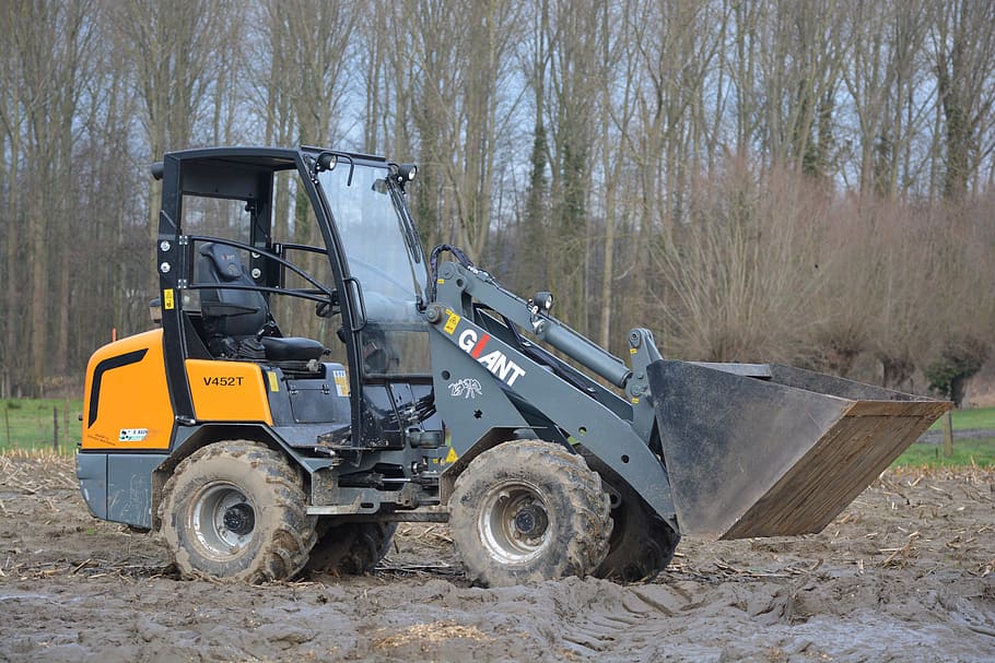 สีดำ, สีเหลือง, payloader, เครื่อง, ล้อ, รถแทรกเตอร์, สนาม, รถขุด, รถปราบดิน, โหมดการขนส่ง, ที่ดิน, การขนส่ง, ยานพาหนะบก, วัน, ธรรมชาติ, เครื่องจักรก่อสร้าง, เครื่องจักรกล, กลางแจ้ง, อุตสาหกรรมการก่อสร้าง, ไม่มีคน, ต้นไม้, ทหาร, อุตสาหกรรม, เครื่องเขียน, มุมมองด้านข้าง, รถบรรทุก, ยานพาหนะเชิงพาณิชย์, ผู้เสนอญัตติโลก, อุปกรณ์ก่อสร้าง, 5K