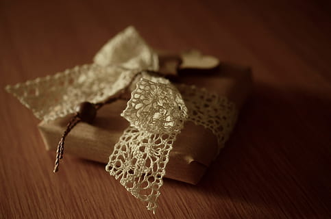 brown, wrap, gift box, gift, box, band, border, crochet, loop, packaging, packed, made, pack, birthday, give away, give, strip, gift tape, wood - material, indoors, no people, table, close-up, studio shot, focus on foreground, food and drink, selective focus, high angle view, food, still life, textile, single object, wellbeing, luxury, wealth, simplicity, healthy eating, jewelry, 4K, CC0, public domain, royalty free