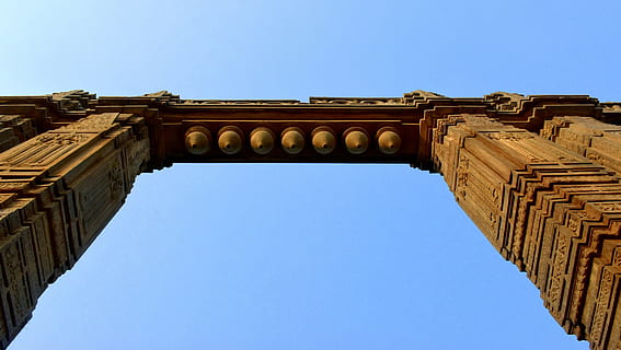 architecture, gate, arch, stone, ancient, sky, clear sky, low angle view, built structure, the past, history, blue, travel destinations, no people, nature, day, building exterior, ancient civilization, travel, tourism, city, old ruin, outdoors, archaeology, architectural column, ancient history, 4K, CC0, public domain, royalty free