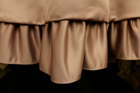 ruffle, hemline, hem, satin, indoors, textile, stage theater, arts culture and entertainment, stage - performance space, no people, stage, curtain, standing, copy space, preparation, seat, theatrical performance, close-up, performing arts event, focus on foreground, front view, 5K, CC0, public domain, royalty free