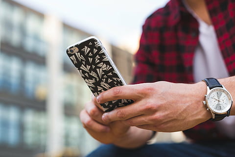 person, holding, gold iphone 7, black, white, case, people, man, guy, iphone, accessory, mobile, phone, texting, gadget, technology, communication, watch, men, business, one person, adult, time, human hand, focus on foreground, wristwatch, human body part, hand, young adult, close-up, midsection, architecture, day, front view, outdoors, 4K