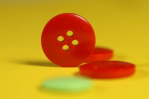 button, red, yellow, buttons, tailor, dress, 4, holes, round, detail, macro, close-up, colored background, studio shot, indoors, no people, still life, yellow background, selective focus, food, food and drink, multi colored, easter egg, vibrant color, egg, shiny, leisure games, group of objects, 1080P, CC0, public domain, royalty free