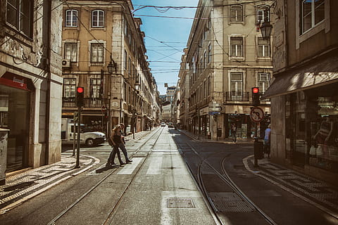 street shot, showing, red, lights, traffic signal, Street, shot, red lights, Lisbon, Portugal, urban, urban Scene, city, architecture, city Life, europe, built Structure, building Exterior, cityscape, outdoors, people, travel, day, transportation, railroad track, track, rail transportation, the way forward, incidental people, direction, mode of transportation, diminishing perspective, sign, nature, sky, road, building, 4K