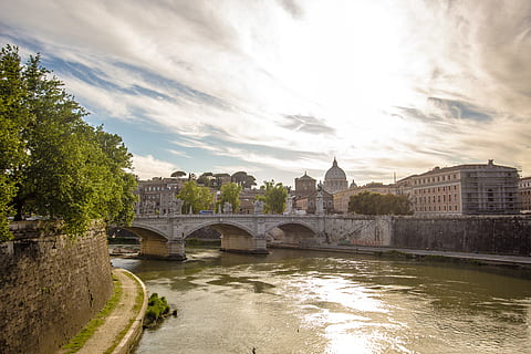 body, water, high, rise building, daytime, architecture, bridge, buildings, city, outdoors, river, sky, town, trees, built structure, connection, bridge - man made structure, building exterior, cloud - sky, arch bridge, nature, travel destinations, building, transportation, arch, no people, history, cityscape, 5K, CC0, public domain, royalty free