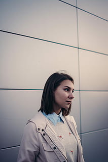 woman, beige, jacket, standing, wall, women, people, one Person, females, young Adult, outdoors, adult, beautiful, beauty, portrait, fashion, caucasian Ethnicity, looking, lifestyles, urban Scene, one young woman only, one woman only, adults only, young women, real people, wall - building feature, leisure activity, looking away, front view, casual clothing, hairstyle, beautiful woman, contemplation, 5K, CC0, public domain, royalty free