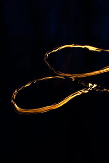 Feuer, Feuershow, Flamme, Bewegung, Verbrennung, schwarzer Hintergrund, abstrakt, orange Farbe, keine Leute, Studioaufnahme, Natur, Muster, beleuchtet, Rauch - physische Struktur, drinnen, Nacht-, Langzeitbelichtung, Nahansicht, Licht - natürliches Phänomen, kopieren sie platz, gestalten, Design, 5K, CC0, gemeinfrei, lizenzfrei