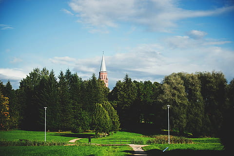 clouds, building, trees, countryside, architecture, daylight, grass, park, rural, tower, plant, tree, sky, cloud - sky, nature, green color, growth, no people, day, sport, land, field, outdoors, built structure, park - man made space, beauty in nature, 5K, CC0, public domain, royalty free