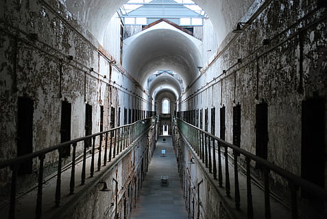 abandoned, arch, architecture, building, hallway, metal, railings, rusty, prison, tunnel, punishment, indoors, corridor, arcade, the way forward, diminishing perspective, direction, prison cell, built structure, railing, wall - building feature, no people, absence, day, old, lighting equipment, ceiling, 2K, CC0, public domain, royalty free