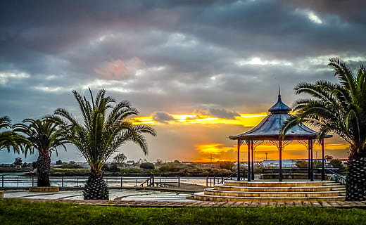 landscape, nature, sky, clouds, idyllic, palm trees, resort, scenic, tranquil, trees, view, cloud - sky, tree, tropical climate, plant, sunset, palm tree, built structure, architecture, water, building exterior, beauty in nature, no people, gazebo, grass, land, travel destinations, religion, outdoors, coconut palm tree, 1080P, CC0, public domain, royalty free
