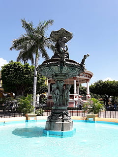 fuente, parque, parque Central, piscina, agua, azul, complejo turístico, árbol, naturaleza, palmera, escultura, planta, arquitectura, cielo limpio, clima tropical, día, representación, cielo, nadie, destinos de viaje, Arte y artesanía, al aire libre, pulverización, color turquesa, agua que fluye, 4K, CC0, dominio público, libre de derechos