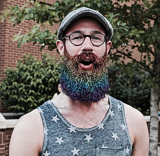 man opening, mouth, standing, front, green, leaf tree, daytime, rainbow beard, beard, rainbow, glasses, portrait, front view, looking at camera, young adult, headshot, one person, real people, leisure activity, lifestyles, eyeglasses, day, young men, facial hair, casual clothing, fashion, mustache, outdoors, mouth open, human face, 2K, CC0, public domain, royalty free