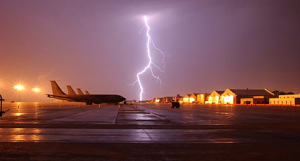 airplane, parked, concrete, road, lightning thunder, nighttime, lightning, strike, night, storm, bolt, weather, thunderstorm, electricity, airfield, planes, aircraft, airplanes, nature, sky, power, energy, flash, charge, bright, force, light, stormy, discharge, striking, power in nature, cloud - sky, transportation, illuminated, mode of transportation, sign, beauty in nature, warning sign, no people, storm cloud, architecture, water, outdoors, extreme weather, purple, rain, 1080P, CC0, public domain, royalty free
