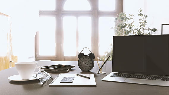laptop computer, alarm clock, desk, workbench, macbook, table, fresh, work, computer, coffee, workspace, office, laptop, clean, wireless technology, cup, technology, communication, furniture, indoors, mug, window, drink, coffee - drink, coffee cup, connection, food and drink, business, no people, crockery, keyboard, 4K, CC0, public domain, royalty free