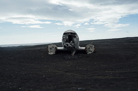 white, plane wreckage, land, wrecked, airplane, sand, dunes, crash, wreck, damage, beach, sky, no people, outdoors, day, cloud - sky, nature, history, military, metal, the past, cannon, war, weapon, old, air vehicle, horizon, environment, architecture, conflict, 2K, CC0, public domain, royalty free
