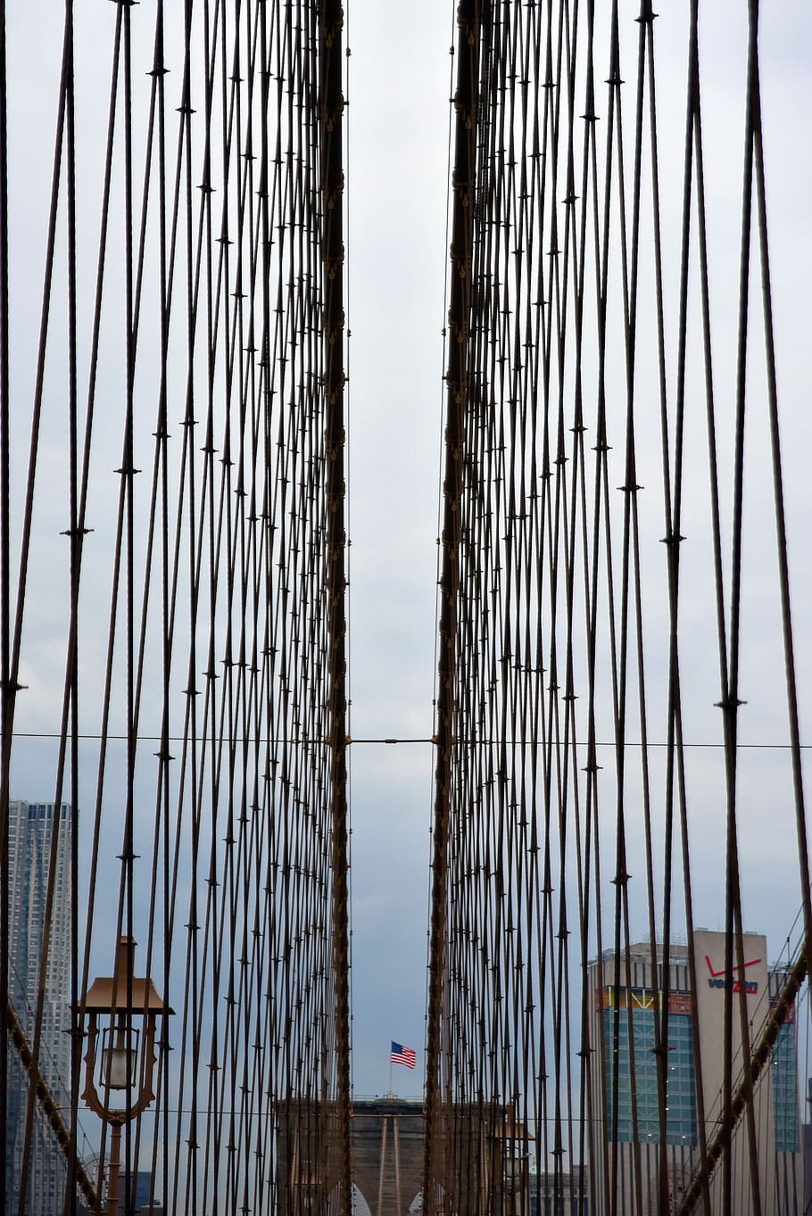 manhattan bridge, architecture, expression, steel, pattern, iron, abstract, city, outdoors, construction, ny, urban, american flag, flag, usa, new, york, new york, built structure, sky, low angle view, no people, suspension bridge, bridge - man made structure, bridge, connection, transportation, tourism, nature, day, travel destinations, travel, cable, building exterior, skyscraper, office building exterior, 5K