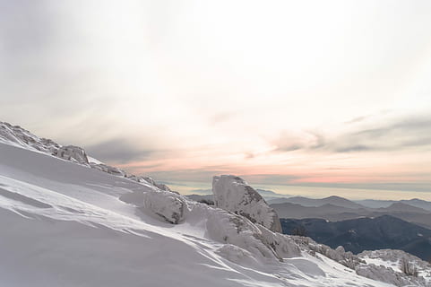 snow, covered, ground, overlooking, mountains, daytime, person, taking, photo, snow-covered, mountain, golden, hour, cloud, rock, adventure, morning, ice, mountain range, landscape, cold temperature, winter, beauty in nature, sky, scenics - nature, cloud - sky, tranquility, environment, tranquil scene, nature, white color, non-urban scene, frozen, idyllic, no people, snowcapped mountain, mountain peak, 2K, CC0, public domain, royalty free