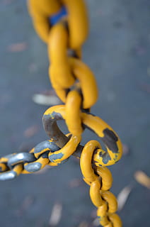 Yellow, Chains, Metallic, Connected, links, flexible, supporting, pulling, loads, symmetrical, shapes, iron, rusty, rustic, locks, strength, connection, no people, close-up, flexibility, chain, metal, selective focus, safety, focus on foreground, nature, high angle view, day, security, outdoors, protection, durability, still life, tied up, hanging, tangled, reliability, 4K, CC0, public domain, royalty free