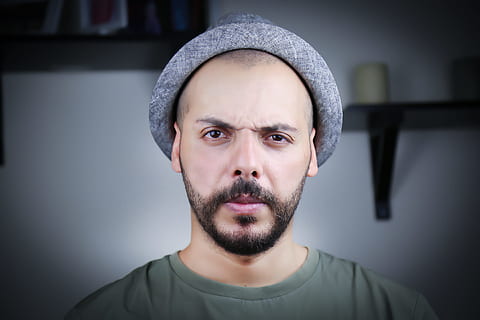 person, blur, hat, face, angry, beard, close-up, depth of field, facial expression, facial hair, focus, guy, looking, portrait, vignette, wear, headshot, front view, looking at camera, one person, adult, indoors, studio shot, body part, human body part, men, mustache, casual clothing, mid adult, human face, 2K, CC0, public domain, royalty free