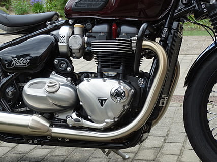 triumph, engine, 1200cc, bobber, mode of transportation, transportation, land vehicle, stationary, day, no people, motorcycle, outdoors, motor vehicle, car, metal, street, parking, headlight, travel, city, scooter, close-up, high angle view, wheel, chrome, silver colored, 5K, CC0, public domain, royalty free